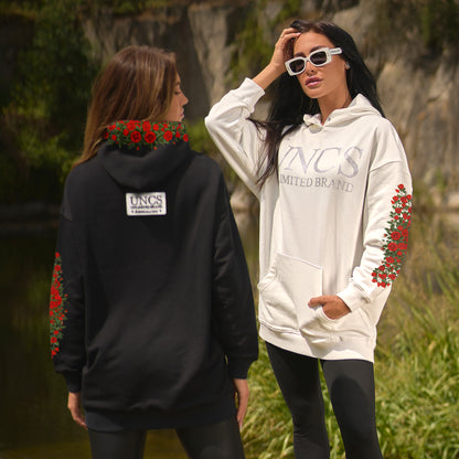 Women in oversize hoodie from UNCS