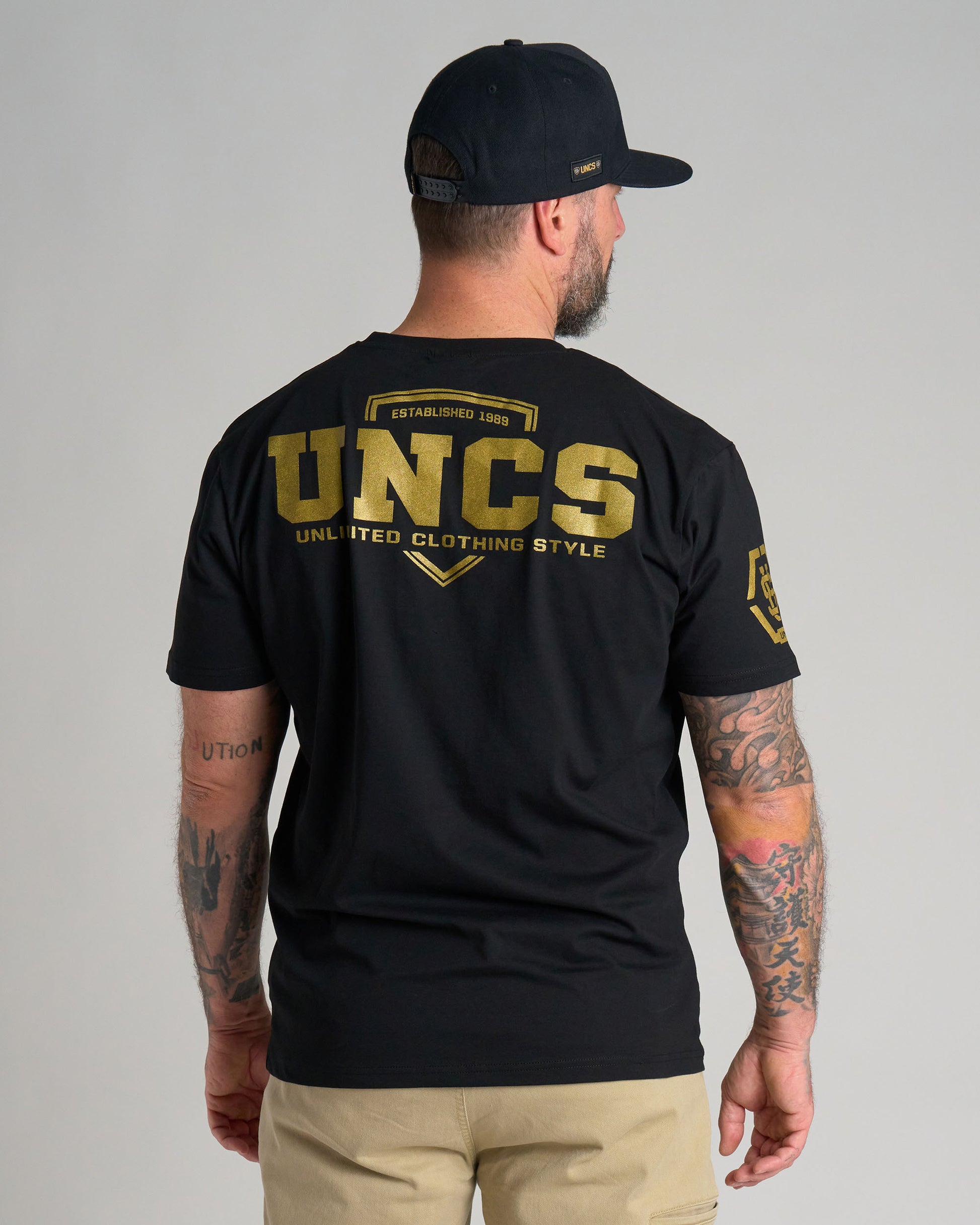 UNCS GOLD Men's T-Shirt BLACK