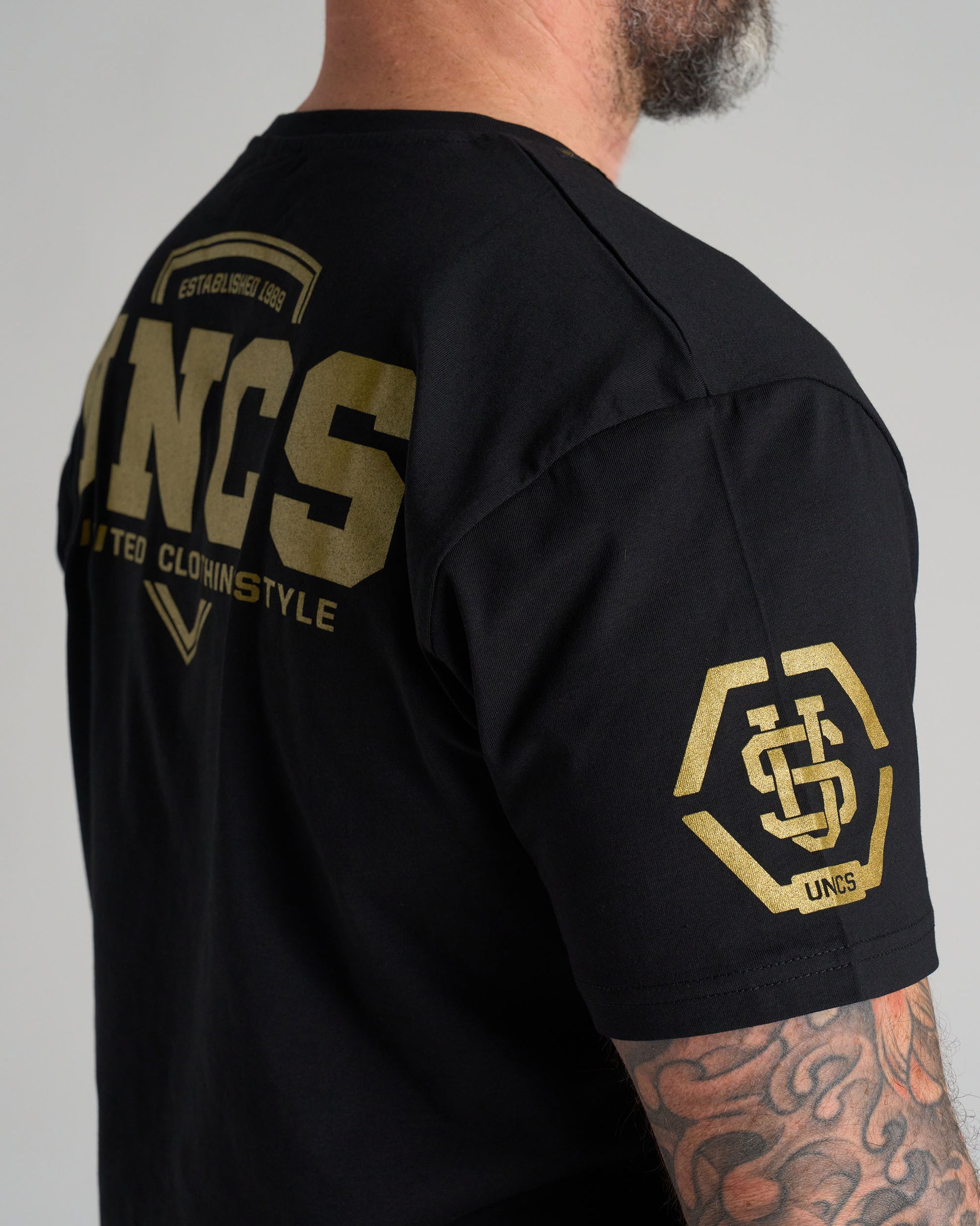 UNCS GOLD Men's T-Shirt BLACK