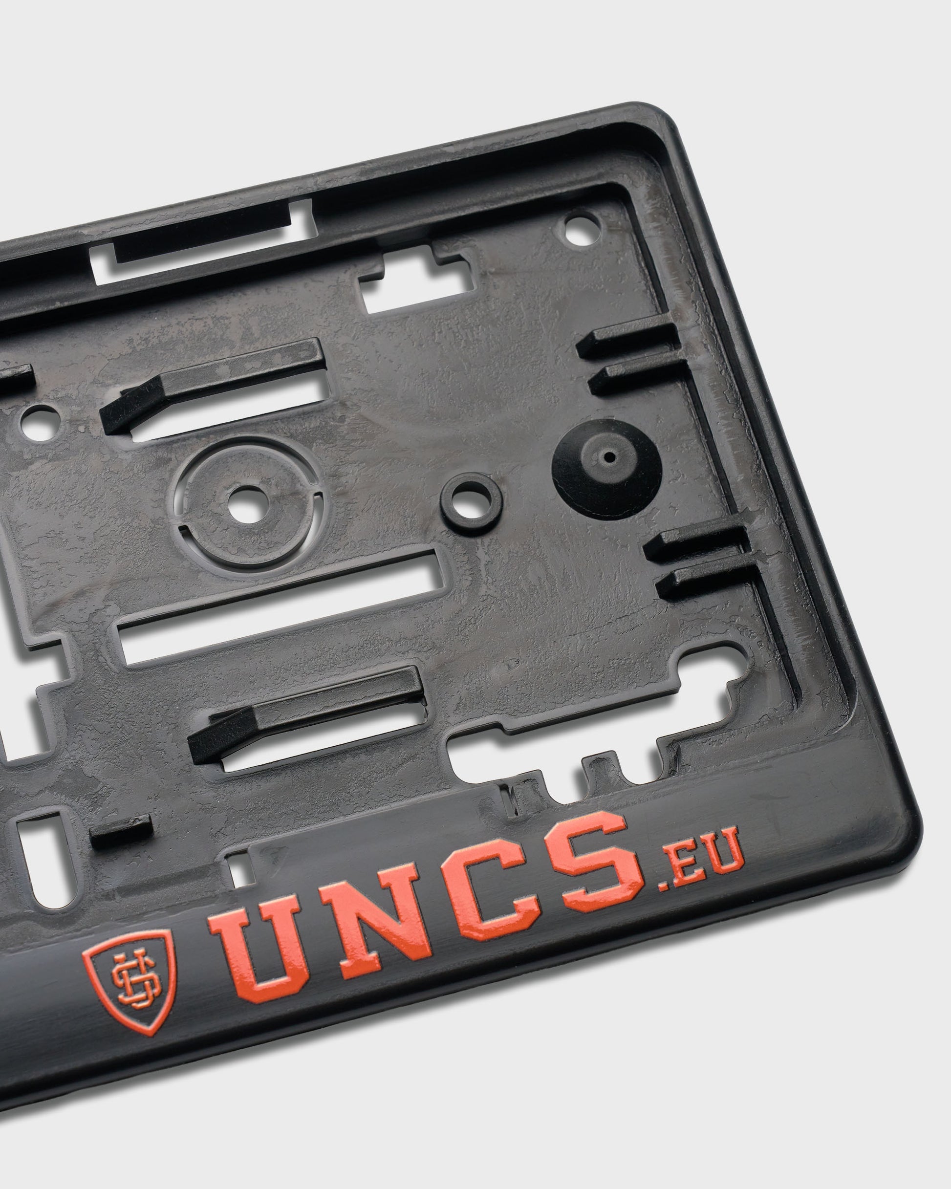 UNCS CAR License Plate Holder BLACK/ORANGE